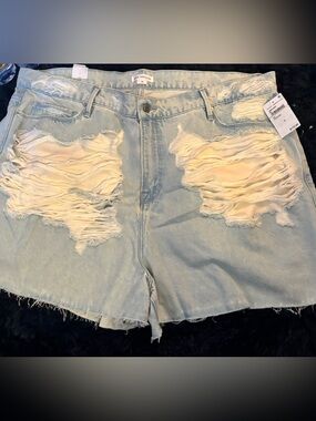 Good American Light Wash Distressed Jean Shorts with Cream Underlay